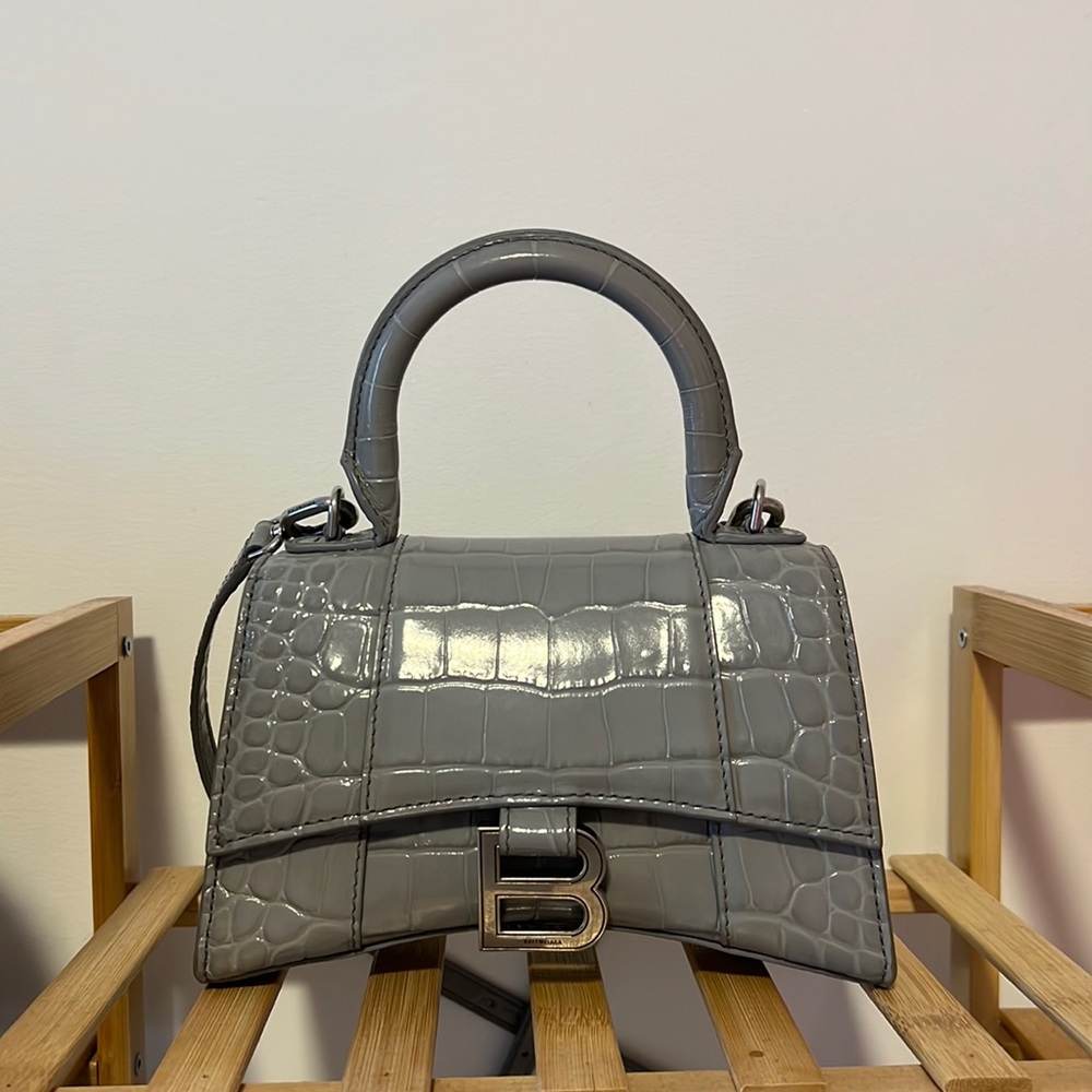 Authentic balenciaga grey snake skin purse . Only worn several times.